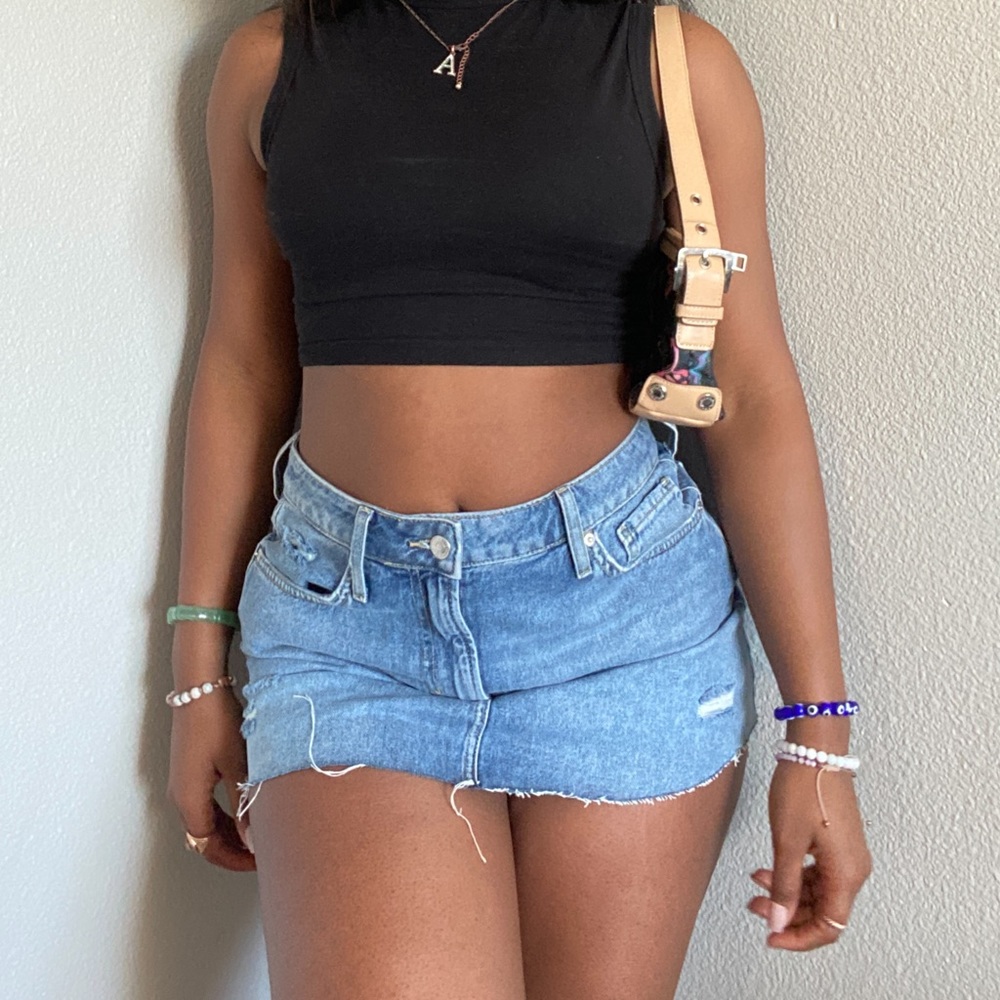 Light Wash Distressed Denim Mini Skirt